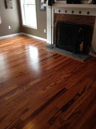 Solid 3 1 4 Brazilian Tigerwood Hardwood Installed In Family Room With A Picture Frame Around The Fireplace Hearth Fireplace Hearth Hardwood Floors Hardwood