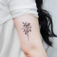 Check spelling or type a new query. Fine Line Rose And Cross Tattoo On The Upper Arm