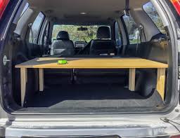 How We Built Our Honda Cr V Sleeping Platform And Why You Should Turn Your Car Into A Camper Escapes Etc Suv Camping Suv Camper Car Camper