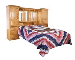 The basic bedroom set includes a bed frame, a nightstand, and a dresser or chest. Amish Country Pier Wall Bed Unit From Dutchcrafters Amish Furniture