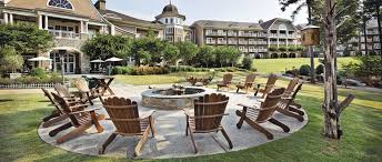 Kick Back In An Adirondack Chair At The Ritz Carlton Reynolds Lake Oconee And Roast S Mores On The Campfire Fall Getaways Lake Oconee Couple Getaway