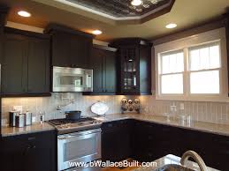 Alright, i believe i know backsplash suggestions for dark granite countertops and maple cabinets, now tell me around backsplash the key is at shades on the backsplash's use when keeping a light to maintain color. Pin By Ashton Rae On Patterson Glen Townhomes Light Granite Countertops Backsplash With Dark Cabinets Home