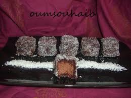 Carres Moelleux Chocolat Noix De Coco Le Sucre Sale D Oum Souhaib En 2020 Moelleux Au Chocolat Noix De Coco Gateau Noix De Coco