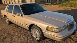Image result for Electric Current Red 1995 Town Car