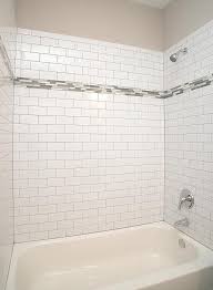 Using a ¾ brick pattern can be helpful if your tile has a slight bow to it (to check if your tile is bowed; White Glass Subway Tile With Grey Grout Novocom Top