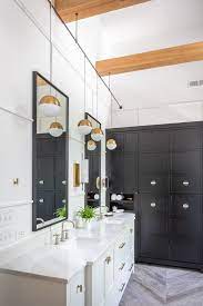 Make it sleek and modern or warm and traditional by changing the shade of green and the finishes of the cabinets and hardware. Black White Modern Farmhouse Bathroom Home Bunch Interior Design Ideas