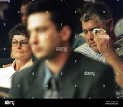 The parents of convicted killer Lawrence Russell Brewer, shown in center,  Helen, left, and Lawrence Russell Brewer Sr., right, listen to the judge  after their son was sentenced to death Thursday, Sept.