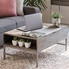 The slightly canted legs of this finely crafted living room table make a powerful style statement, along with its fashionable inset doors, drawer facings, and side panels. Clearfield Solid Wood Storage Lift Top Coffee Table Reviews Joss Main