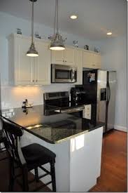 Uba tuba granite fabricated with a half bullnose edge installed on light wood cabinets with a 50/50 image result for honey oak cabinets ubatuba granite. 42 Best Ubatuba Granite Ideas Granite Kitchen Ubatuba Kitchen Remodel