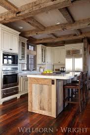 Reclaimed Hand Hewn Beams On Ceiling Reclaimed Hit Miss Pine Flooring Wellborn Wrigh Interior Design Kitchen Rustic Kitchen Design Rustic Kitchen Island