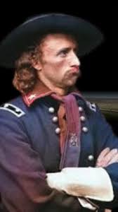 This striking portrait captures General George Armstrong Custer, a  controversial figure in American history known for both his daring military  exploits and his infamous downfall. Custer rose to fame during the American