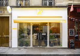 Lighting highlights the food, the decor and items can be hidden away behind a decorative wall, stashed in modern pillars or stored in open. Wall Decor Idea This Restaurant Covered Its Walls With Wood Panels That Look Like Abstract Line Art