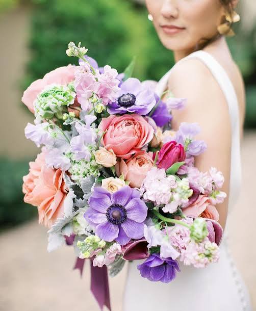 Unforgettable Matrimony: Peach Ranunculus & Purple Anemones Bouquets