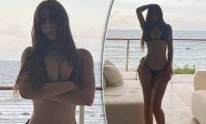 Mikaela Testa shows off incredible beach body in VERY revealing black bikini  | Daily Mail Online