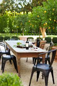 60 Landscaping Ideas That Will Make Any Outdoor Space Feel Majestic Outdoor Dining Room Backyard Dining Outdoor Dining Chairs