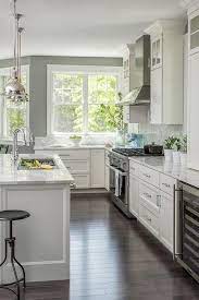 Complete the look with a cool grey backsplash and gorgeous waterproof plank. Pin On Kitchen Ideas