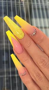 Most women love the feeling they get from a fresh new manicure, which is long ( or short) while we understand that fixing the acrylic nail is one thing and shaping it right is another, bn beauty will be giving you this 2 for 1 special on how to. Nail Art Yellow Nails Design Long Acrylic Nails Coffin Coffin Nails Designs