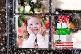 At christmas (hanson cover) anna & brian have recorded some christmas songs for you. Little Girl Waiting For Santa At Home Window On Christmas Eve Stock Photo Picture And Royalty Free Image Image 65480404