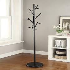 Spruce up your entryway or office with a chic coat stand that also doubles up as an abstract sculpture. Black Coat Rack W Tree Branch Inspired Design Aptdeco