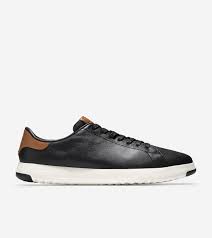 Brands such as cole haan have managed to find a balance between fashion and technology in here, scott patt, cole haan's vp of innovation and design, talks about tapping the expertise of and our grandpro tennis shoe is built around a classic silhouette that's super lightweight and comfortable. Men S Grandpro Tennis Sneaker In Black British Tan Cole Haan