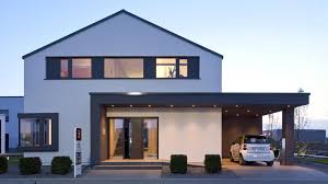 Ein Energiesparhaus In Frechen Je Hoher Die Effizienz Desto Grosser Die Finanzielle Unterstutzung Obs Fassade Haus Haus Modernes Haus