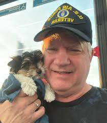 Family adopts adorable yorkie puppy