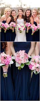 With the cheerful hues of pink present in the bridesmaid's dresses and the groomsmen's trendy bow the bride and groom went with very neutral creams and gold for their design and decor, letting the colors of the wedding party stand out; Southern Bridal Party Navy Blue Bridesmaid Dresses Matching Strapless Gowns P Navy Bridesmaid Dresses Wedding Bouquets Pink Wedding Photography Bridal Party