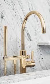 robinetterie or doree baignoire dorn bracht robinet mur sol marbre salle de bain showroom david b paris architecture interi indoor decor basin elegant bathroom