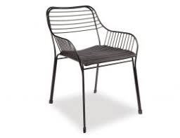 The seat is covered in vinyl with a steel base powder coated in black. Cab Wire Outdoor Dining Chair