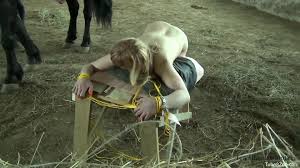 Blonde with a hot bod getting drilled by a horse