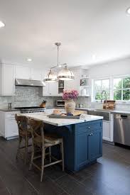 Gorgeous White And Blue Kitchen Features A Blue Center Island Accented With A White Marble Stools For Kitchen Island Blue Kitchen Island Kitchen Island Design