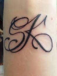 Initial tattoos can be worn by both men and women. Initial Tattoo Kids Initials Initial Tattoo Herz Tattoo Initialen