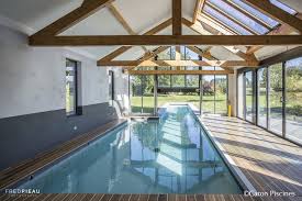 Piscine Interieur Exterieur Caron Teck Veranda Ambiance Design Piscine Interieure Piscine Exterieure Veranda Piscine