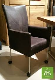 pin op teakhuis gestoffeerde stoelen