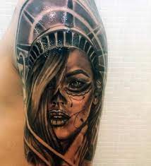 The statue of liberty national monument has served as an important symbol for the united states. 70 Statue Of Liberty Tattoo Designs For Men New York City