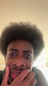 Duke Dennis Reading to Kids