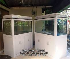 Aquarium unik ini belum pernah ditemui atau dibuat di negara lain, mungkin anda berminat untuk membuat jenis aquarium yang lebih unik? Bufet Aquarium Minimalis Putih Duco Rizki Raya Mebel