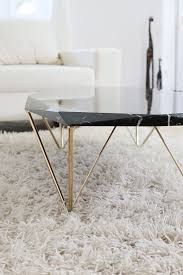 Traditional wood coffee table is the perfect piece to anchor your living space 12 Best Black Marble Coffee Tables
