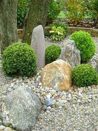 Whether you have a small desktop zen garden or a large outdoor zen garden, you can express yourself creatively as you find new patterns for the sand or gravel and new positions for the rocks. Small Japanese Garden Design Rock Garden Design Japanese Garden Style Small Japanese Garden