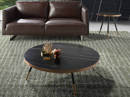 This is a great coffee table for the money. Porcelain Black Marble And Steel Round Coffee Table Angel Cerda