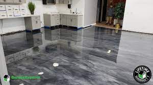 Decorative epoxy floor coatings seamless flooring for garage, basement, workshop, equipment shed, greenhouse, barns, retail outlets, food or we specialize in: Epoxied Garage Floors