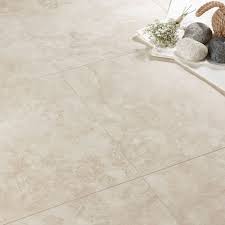 It's warmer to the touch than travertine, for more comfort underfoot. Quickstep Tila Cream Travertine Tile Effect Laminate Flooring 1 M Pack