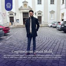 Congratulations, JUNAID MALIK! We are delighted to announce that Junaid  Ahmed Malik, a PhD scholar from the Department of Biomedical Engineering,  has been honored with the prestigious 𝑩𝒆𝒔𝒕 𝑶𝒓𝒂𝒍  𝑷𝒓𝒆𝒔𝒆𝒏𝒕𝒂𝒕𝒊𝒐𝒏 𝑨𝒘𝒂𝒓𝒅 at