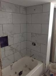 Read customer reviews and common questions and answers for tile & mosaic depot part #: Home Decorators Collection Carrara Polished 12 In X 24 In Polished Porcelain Floor And Wall Tile 16 Sq Ft Case Nhdcarr1224p The Home Depot Small Bathroom Remodel Bathroom Shower Walls Minimalist Small Bathrooms