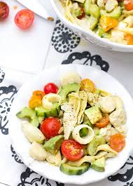 Hearts Of Palm Salad With Artichoke Hearts Cucumber And Avocado Recipe Hearts Of Palm Salad Artichoke Salad Recipes Artichoke Recipes