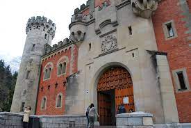 Book the perfect schloss neuschwanstein tour! Germany Neuschwanstein Castle Red Brick Entrance Gatehouse 3 Neuschwanstein Castle Ruins Architecture Germany Castles