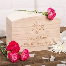 A lot of gifts people get are something that they'd never want, and definitely don't need, so giving money is a great way to avoid that awkward exchange. Personalised Wooden Money Box Wedding Fund
