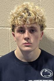 Trojan wrestlers catch a break to beat State College