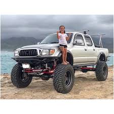 Check Out This Tacoma Build With Red Ori Struts In Hawaii By Jensen Kona Jensen Bros Has Struts In Stoc Toyota Tacoma Lifted Toyota Tacoma 4x4 Toyota Trucks
