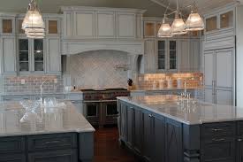 Where styles come together.painted canyon creek cabinet company cabinets paired with a high gloss slate grey island. Double Kitchen Islands Transitional Kitchen Restoration Hardware Silver Sage Amy Tyndall Designs